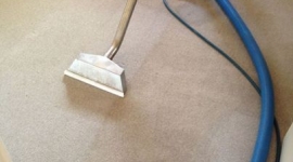 Carpet being cleaned after cheap carpet cleaner had been used
